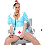 Pic of Sexy nurse Jasmine Jones removes her latex outfit in a safe for work manner