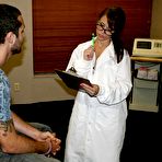 Pic of Sweet brunette nurse in glasses gives a sensual handjob to a lucky guy