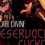 Pic of Maitresse Madeline penetrates a cuckolds asshole while having kinky sex