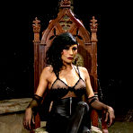 Pic of Beretta James gives her slave boy a handjob after dominating him