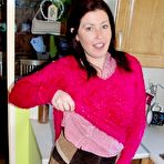 Pic of British woman Juicey Janey takes a pee while squatting on top of a toilet