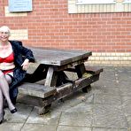 Pic of Older blonde amateur Barby Slut flashes while out in public places