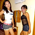 Pic of Asian girls Irish and Leann get completely naked atop a bed