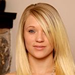 Pic of Natural blonde Teagan shows the pink of her pussy after undressing