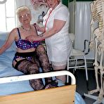 Pic of Redheaded nurse Valgasmic Exposed and a busty older lady play with a skeleton