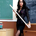 Pic of Lusty teacher MILF Tabitha Stevens takes off her panties on the table