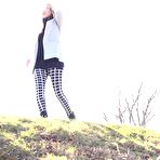 Pic of Blonde chick Delphine pulls down her leggings for a pee in a public place