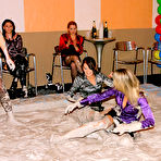 Pic of Fully clothed fashionistas make a wild catfight in the mud