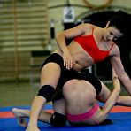 Pic of Catfight scene features pussy and ass lick from Kerry in tight shorts