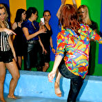 Pic of Kinky fully clothed gals on high heels are into wet catfight