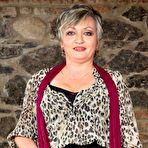 Pic of Old lady with short hair is undressed after kissing her toy boy