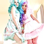 Pic of Kinky cosplay chicks Olivia Grace and Onyx Viper removing fishnet stockings