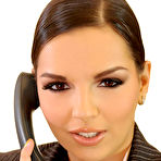 Pic of Hot secretary Eve Angel masturbates at work wearing tan stockings