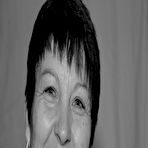 Pic of Mature redhead Savana wears her hair short during a hardcore POV fuck on a bed