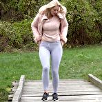 Pic of Blonde Katy Sky shows her bald beaver while squatting outside for a pee