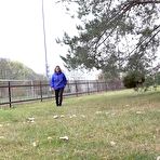 Pic of White girl Naomi Benet takes a badly needed piss on the grass in public