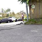 Pic of Distressed girl Isabel Dark takes a badly needed pee on a paved roadway