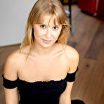 Pic of Young blonde Casey proudly shows her hairless pussy while totally naked