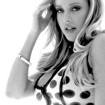 Pic of Blonde slut Samantha Saint giving a pierced nipple titjob and licking cock