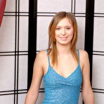 Pic of Sweet teen spreads and fingers her tight slit after getting naked
