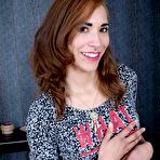 Pic of Skinny redhead Enora Madenn leaps into the the air after stripping naked