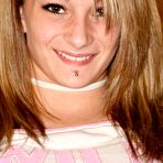 Pic of Pretty blonde amateur Leo with pierced lip flashes her naked boob