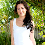 Pic of College girl Renee Roulette strips down to black panties on a garden pathway