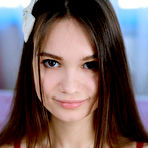 Pic of Sweet teen Anastasia Bella removes sensual lingerie in white nylons