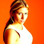 Pic of Hot amateur Tara undressing to tease with her round ass in sexy underwear