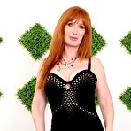 Pic of Mature sexy redhead Freya Fantasia sucks cock & masturbates in black stockings