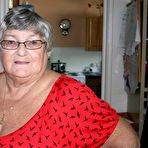 Pic of Obese nan Grandma Libby parts her shaved pussy after removing satin underwear