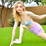 Pic of Skinny blonde Hailee displays her flexibility before masturbating in a yard