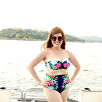 Pic of Chubby mature Holly Fuller doffs bikini to flaunt her big tits & ass on a boat
