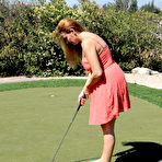 Pic of Big boobed MILF Elexis Monroe rubs her hairy muff at the golf court