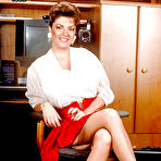 Pic of Older Greek office worker Diane Poppos showing off sexy legs in stockings