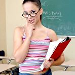 Pic of Sexy college girl in glasses Cristina Agave strips and shows pussy