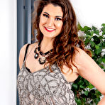 Pic of Over 30 woman removes a velour miniskirt on her way to getting nude in hosiery