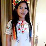 Pic of Asian chick Aziza replaces flowers on her head with cum on her pussy