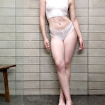 Pic of Solo girl Maddi Winters crosses her bare legs while undressing in a shower