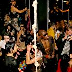 Pic of Drunk chicks douse themselves in champagne before sucking cock in nightclub