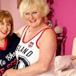Pic of Mature woman Claire Knight has lesbian sex with a fatty on her bed