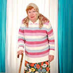 Pic of Fat granny Alice B taking cumshot on big belly after hardcore doggy sex