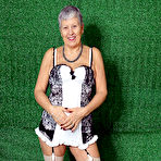 Pic of Silver haired granny Savana models sexy lingerie in sheer nylons and heels