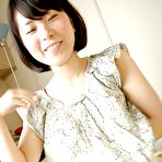 Pic of Smiley asian teen stripping down and showing off her trimmed pussy