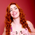 Pic of Young redhead Nala Brooks toys her pink pussy on top of her bed