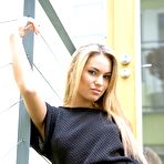 Pic of Hot blonde teen strips down to her high heels in a tempting manner