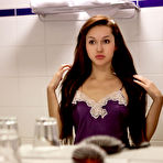 Pic of Ukrainian model Sintia removes satin lingerie before getting ready for bed