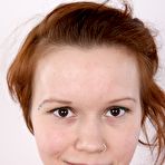 Pic of Natural redhead Klara gets completely naked before a close-up of her pussy