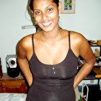 Pic of Indian solo girl pops out her big tits during a set of candid scenes from home - NakedPics