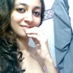 Pic of Indian solo girl holds her face firm while letting nipples free of lingerie - NakedPics